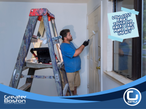 Landlord painting around door frame as part of rental touch-up maintenance
