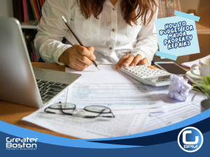 Landlord calculating property repair budget with calculator, laptop, and paperwork