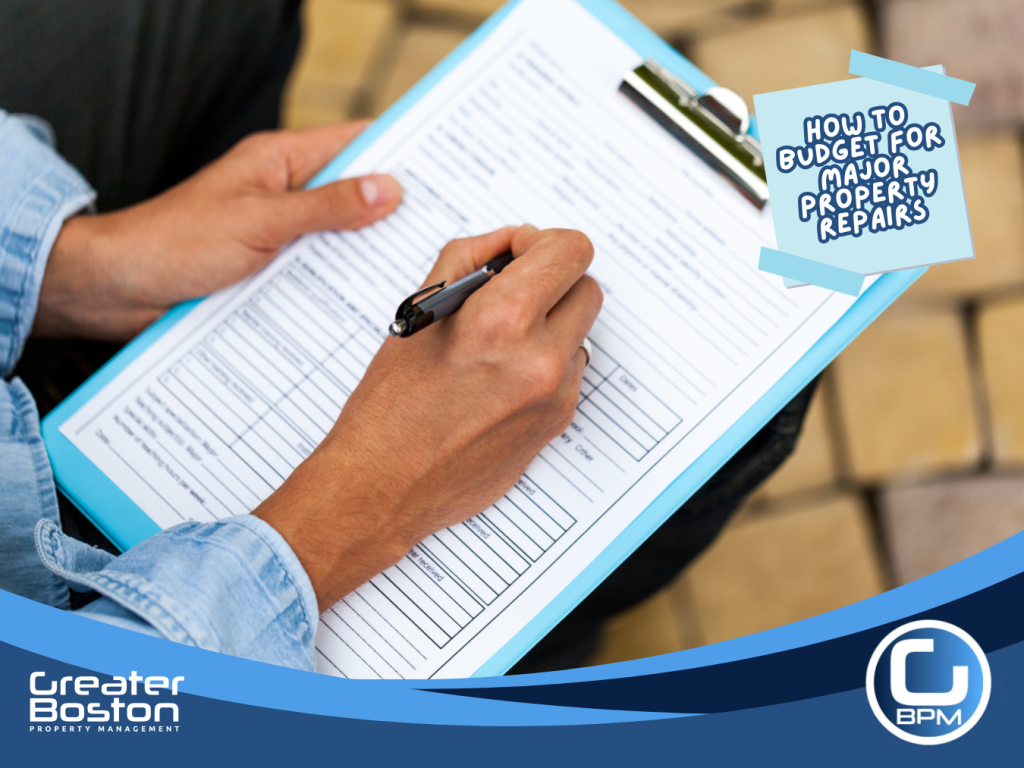 Landlord writing on a property maintenance log checklist to track repairs and recurring issues