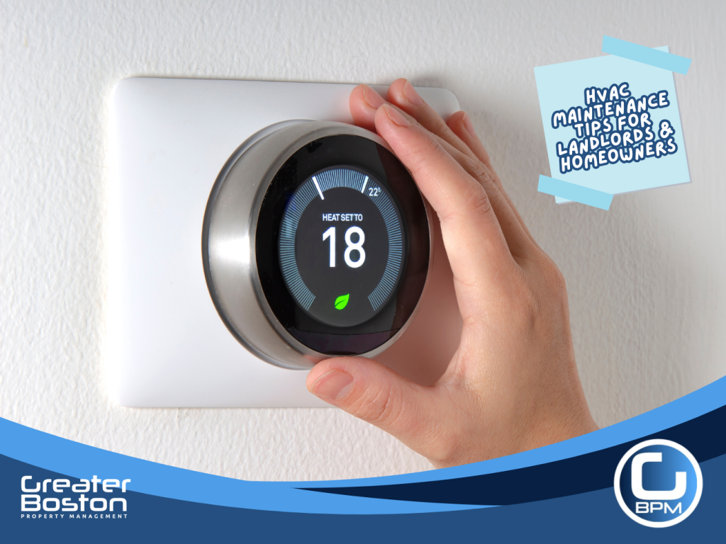 Hand adjusting a smart thermostat to improve HVAC efficiency and save energy