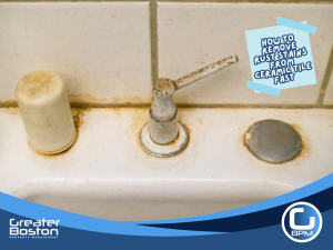 Rust stains on ceramic tile around a bathroom sink faucet