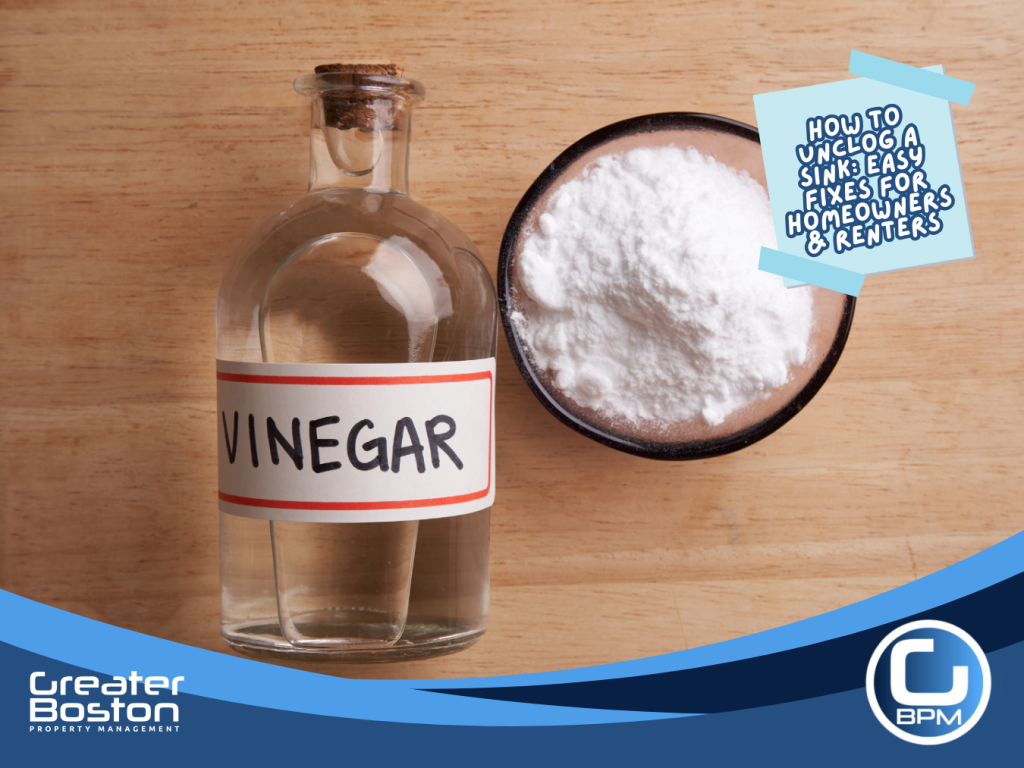 Natural sink unclogging method with baking soda and vinegar on wooden table