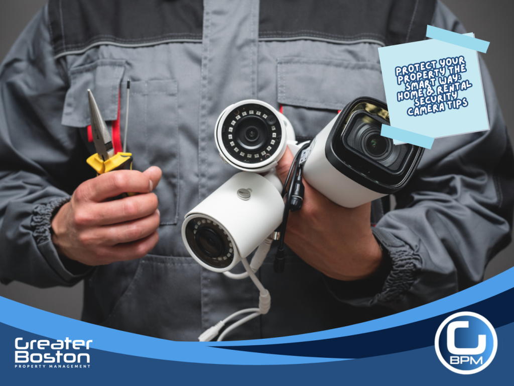 Technician holding security cameras and installation tools for rental property surveillance setup