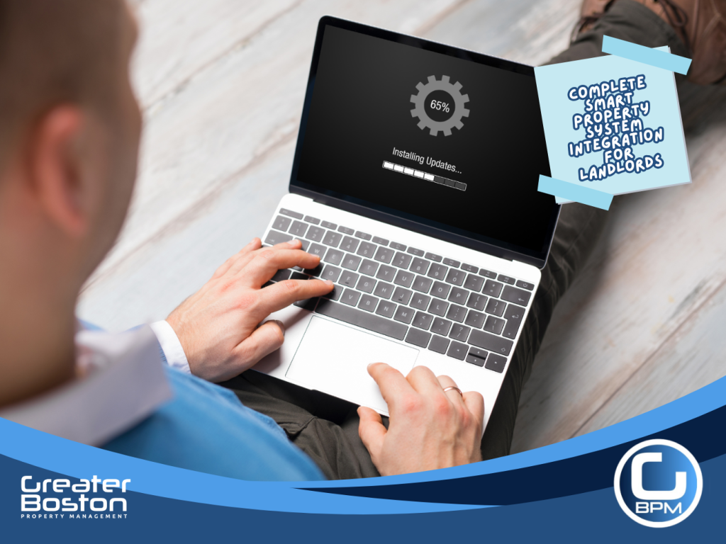 Landlord updating smart property system on laptop as part of regular maintenance and troubleshooting tasks