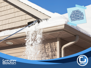 Winter property maintenance showing snow removal from a roof and gutters to prevent ice dams and water damage.