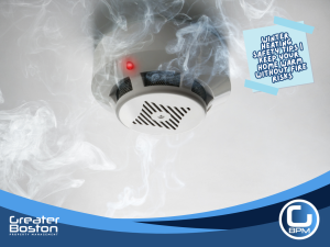 Carbon monoxide detector activated with smoke, highlighting CO safety requirements in rental properties during winter heating season.