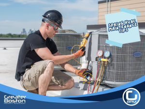 HVAC technician inspecting outdoor air conditioning unit during spring maintenance to prepare AC system for summer.