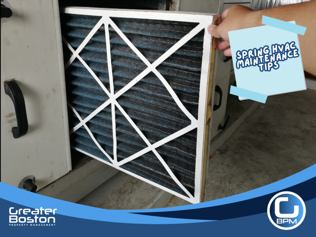 Replacing HVAC air filter during spring AC maintenance to improve airflow, energy efficiency, and indoor air quality in rental properties.