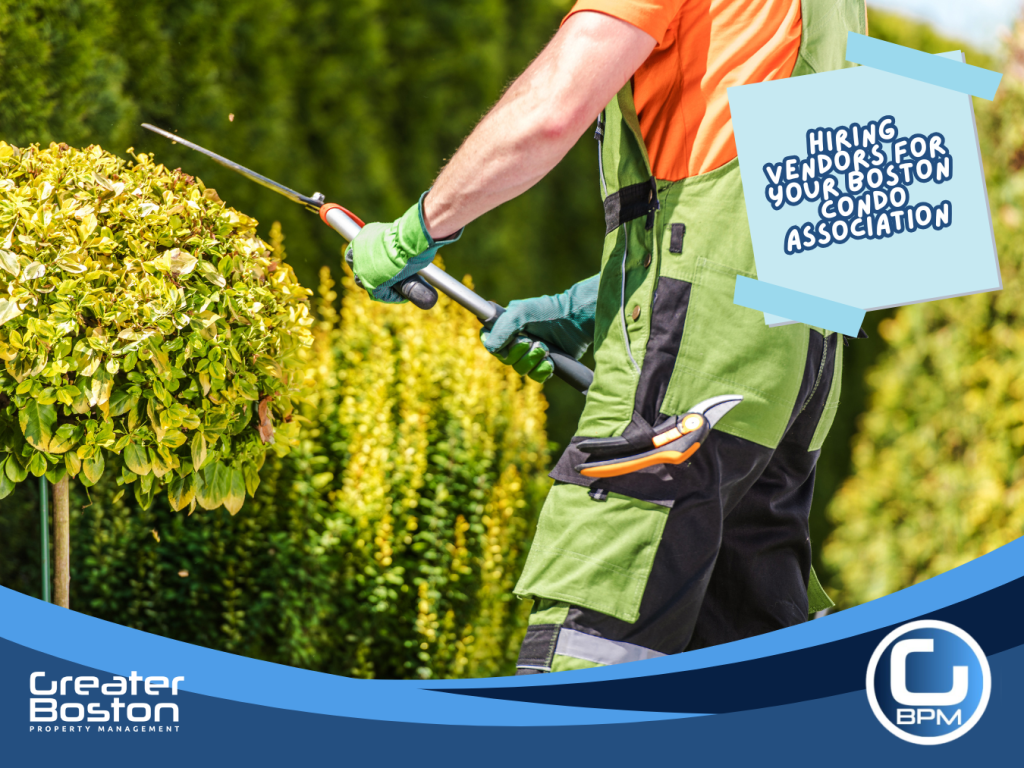 Licensed landscaping vendor trimming hedges and shrubs for a Boston condo association grounds maintenance contract in 2026