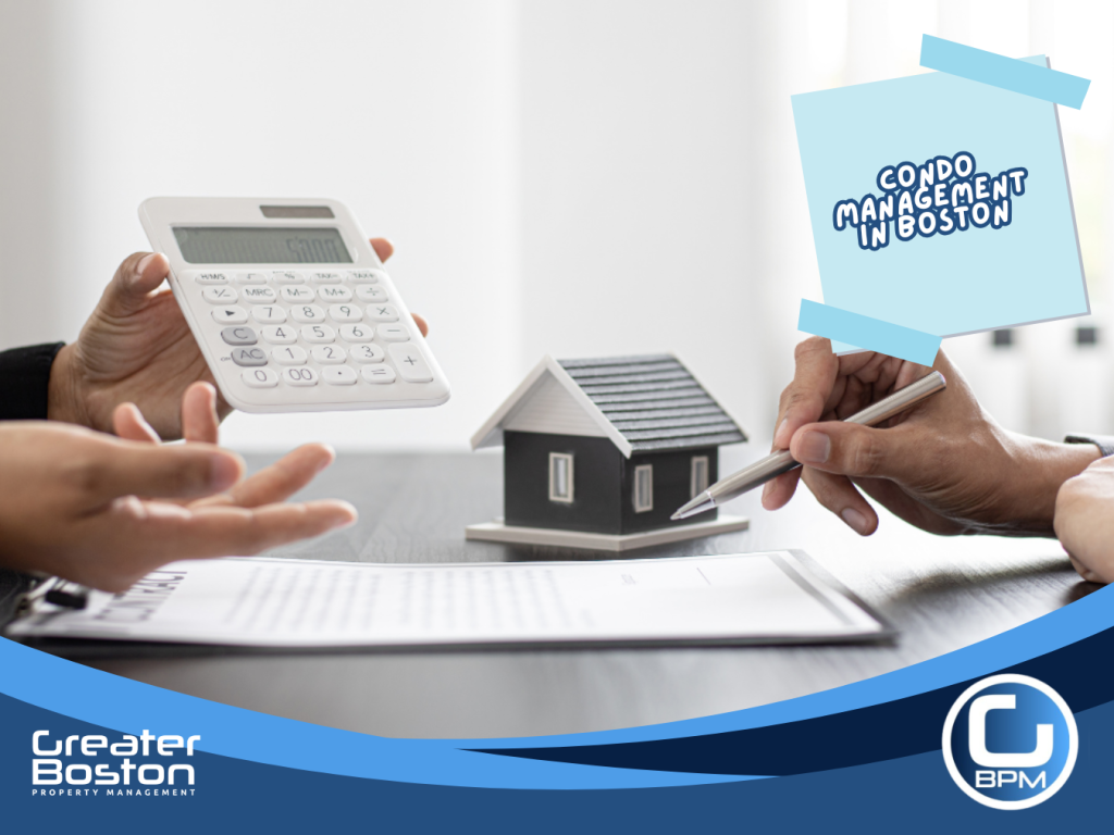 Property manager and landlord reviewing condo management costs in Boston using a calculator and contract documents
