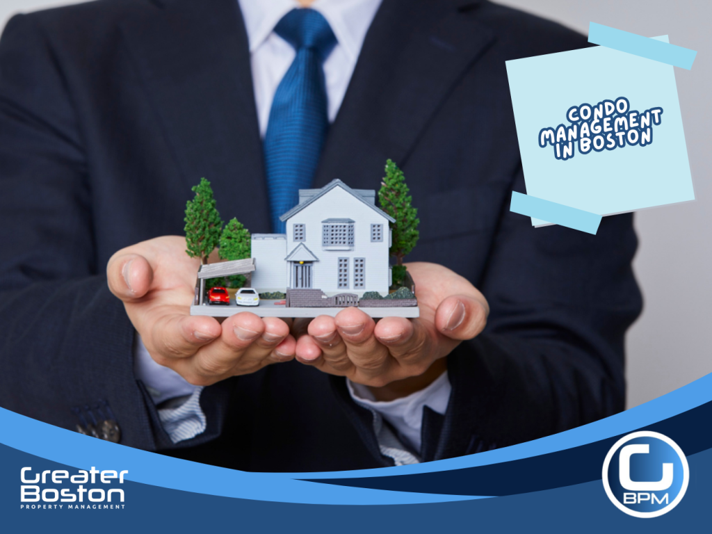Professional property manager in suit holding a miniature home model representing expert condo management services in Boston