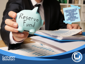Boston condo association trustee holding reserve fund piggy bank over financial documents representing condo reserve fund planning and budgeting requirements for 2026