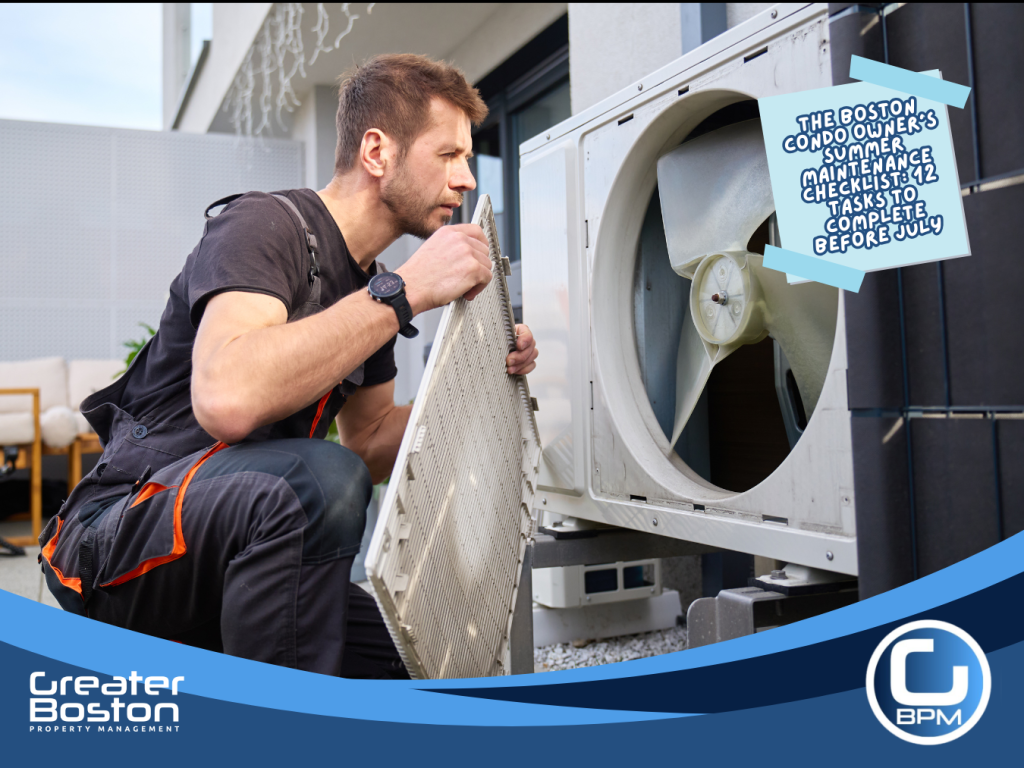 Licensed HVAC technician inspecting and servicing air conditioning unit on Boston condo building rooftop as part of summer mechanical maintenance checklist before July heat wave 2026
