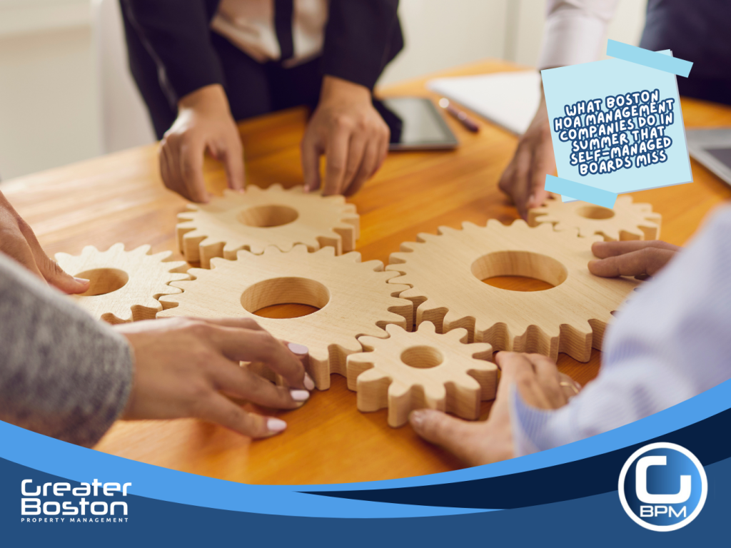 Multiple hands fitting interlocking wooden gear pieces together representing the coordinated professional management systems Boston HOA associations need when they have outgrown self-management in 2026