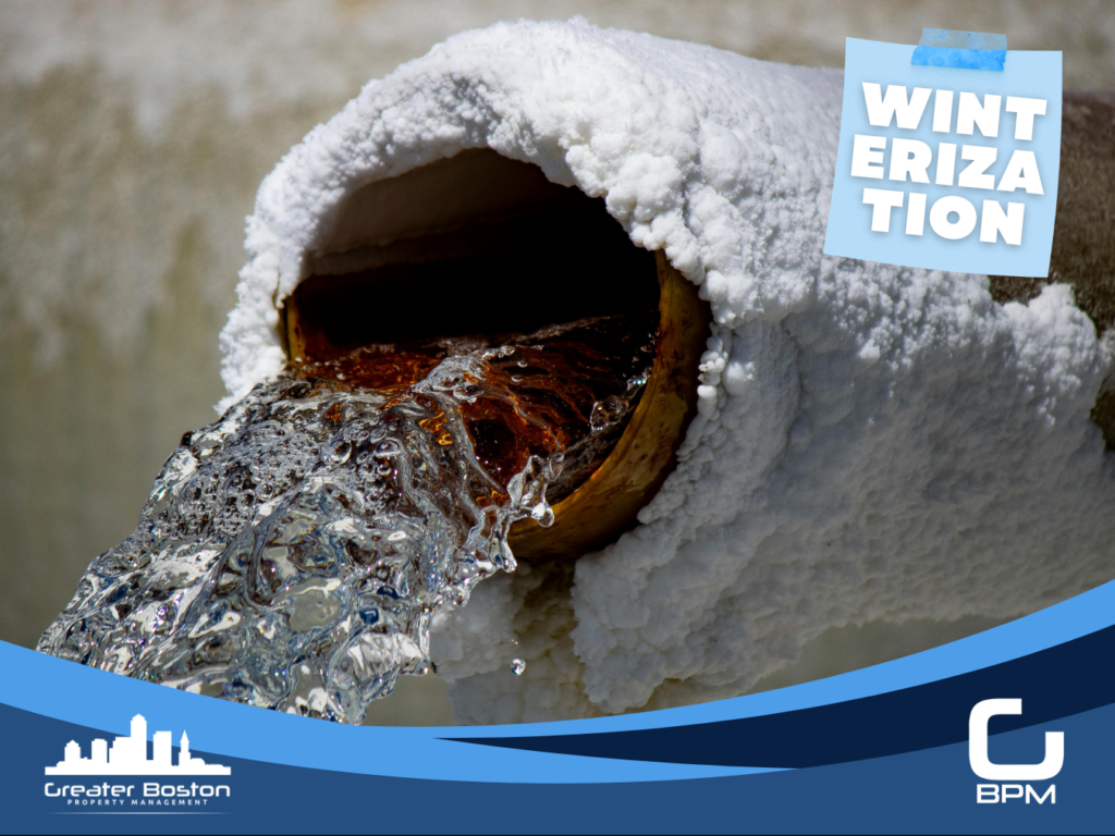 Frozen burst copper pipe encased in snow and ice with water pouring out representing the $5,000 to $25,000 freeze damage claim that Boston condo associations face when winterization is not completed before the first hard frost in 2026